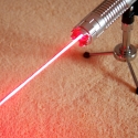 TITAN 635nm red laser pointer in action mountable on a tripod